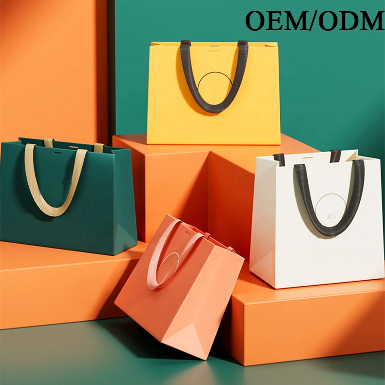 Bagaimana untuk mereka bentuk beg hadiah dengan pemegang?